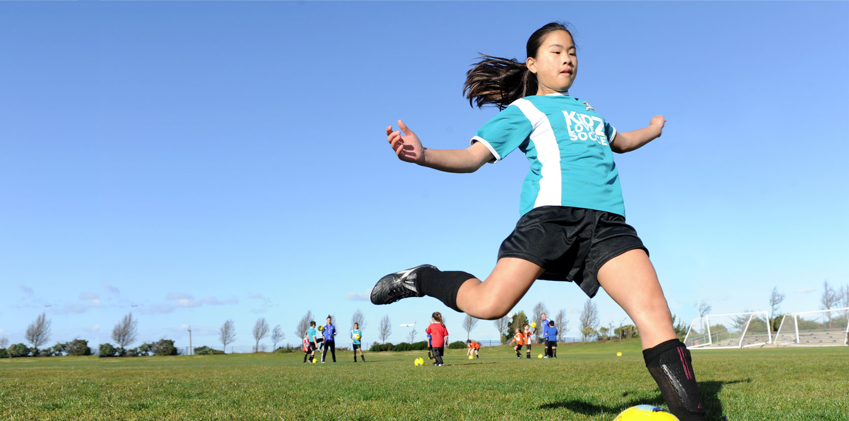 playing soccer image